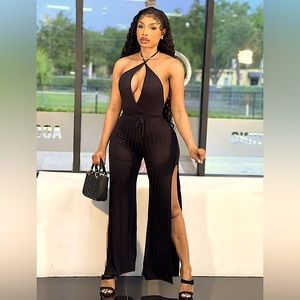 It is NEW black jumpsuit. I have three available S, M and XXL